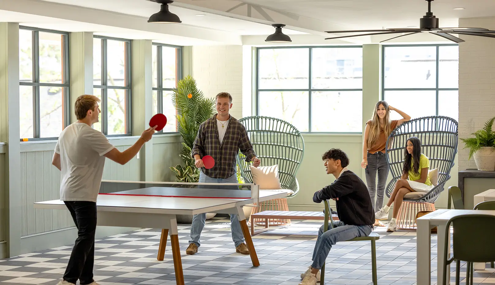 Friends playing ping pong