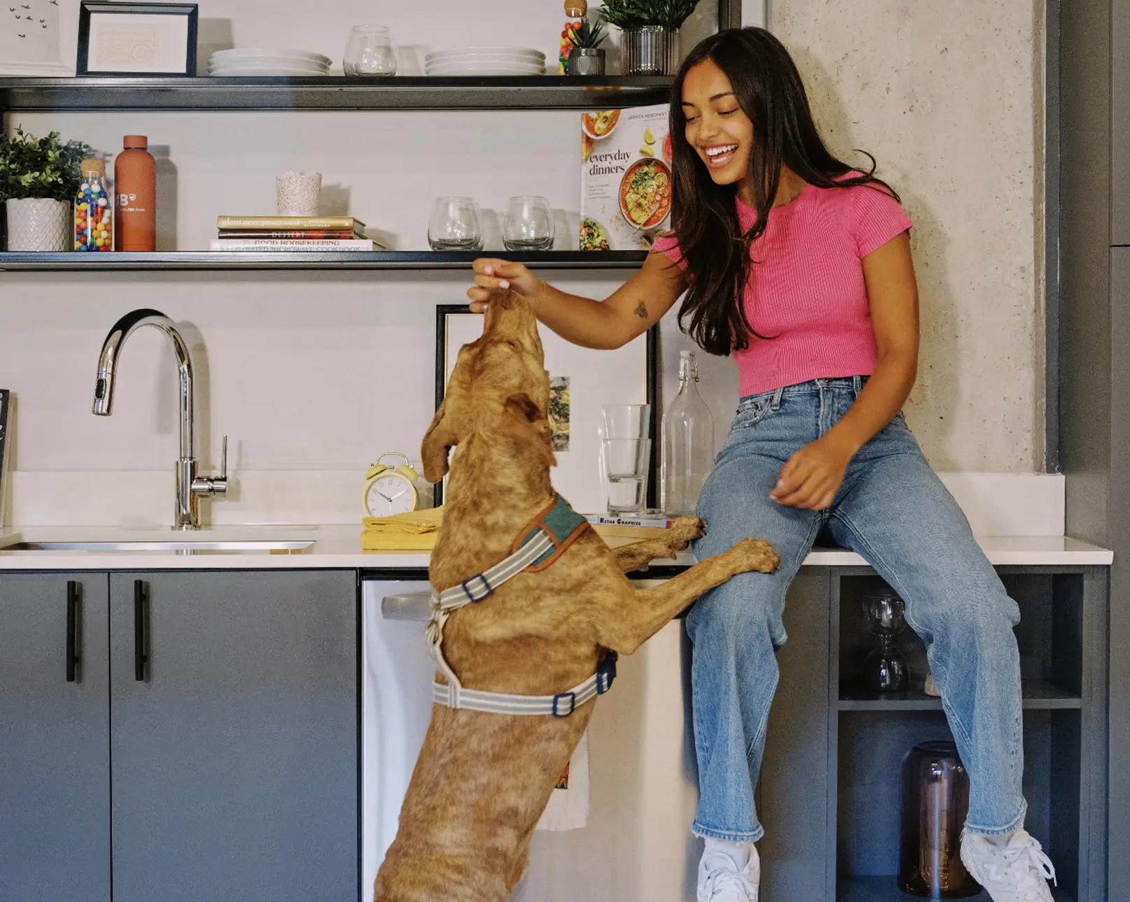 woman playing with her dog