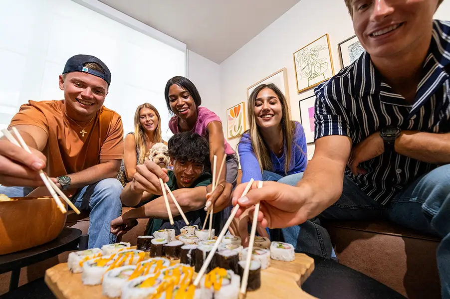 Friends eating sushi