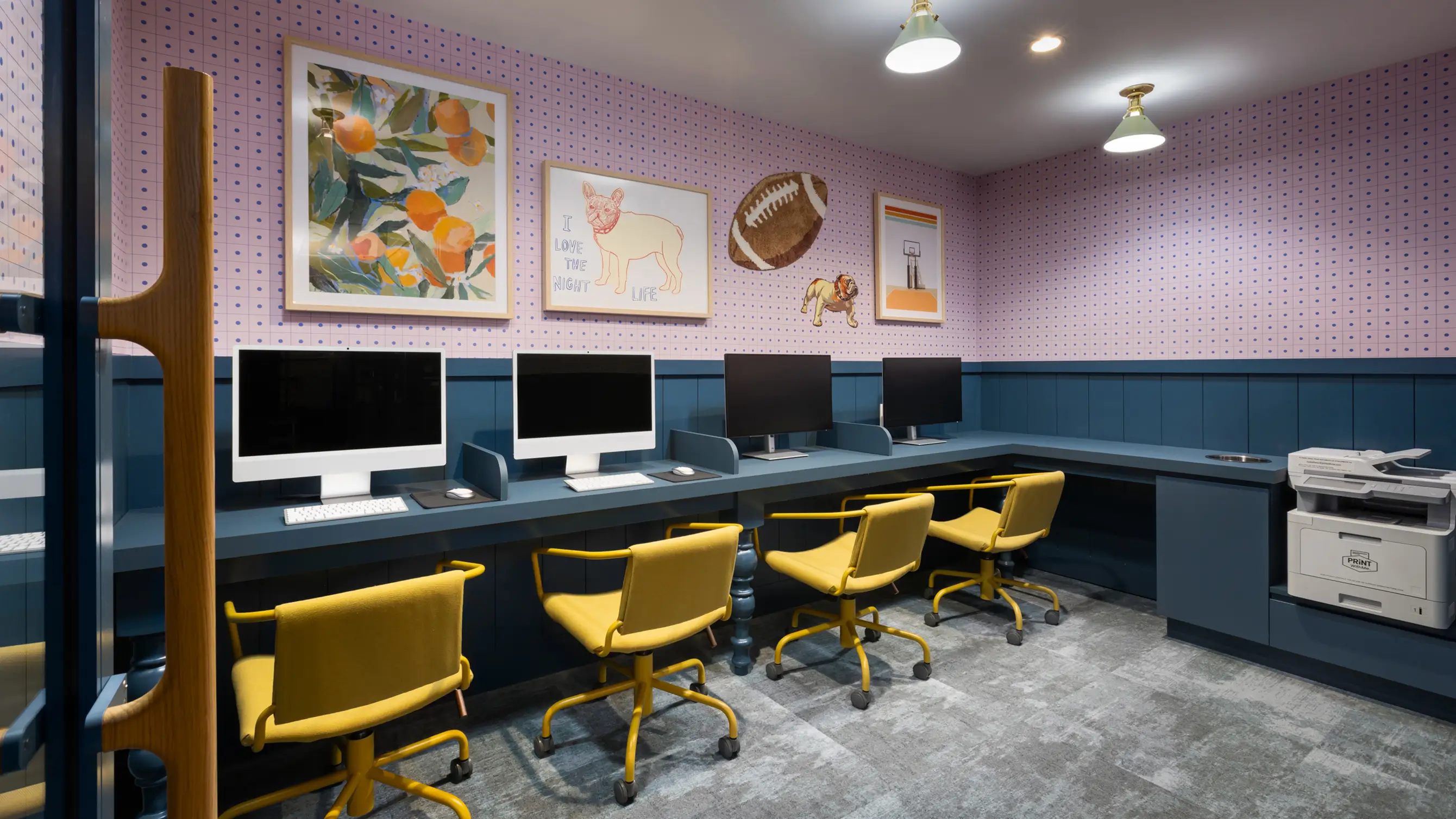 Room with table, chairs, and computers